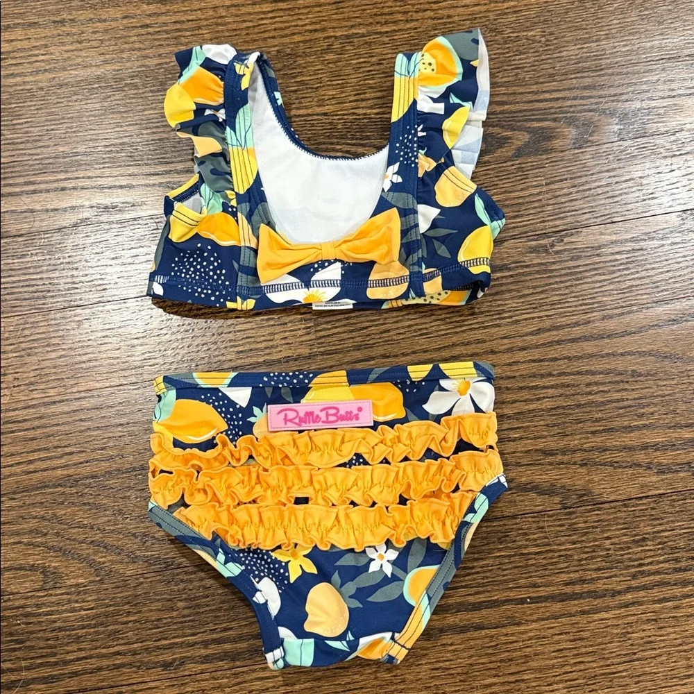 Ruffle Butts Navy Waterfall Bikini Into the Tropics Print 12-18 Months